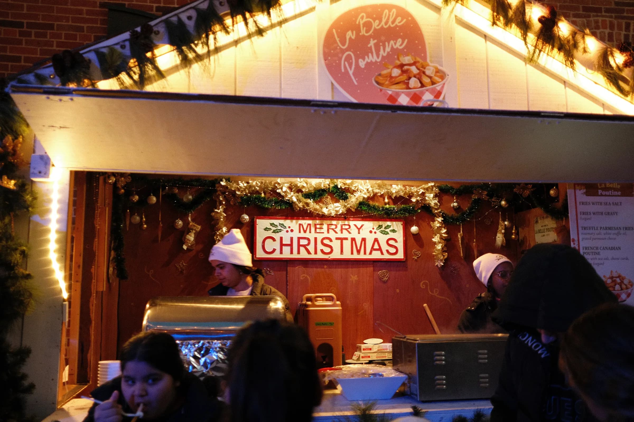 Christmas market counter glowing at night