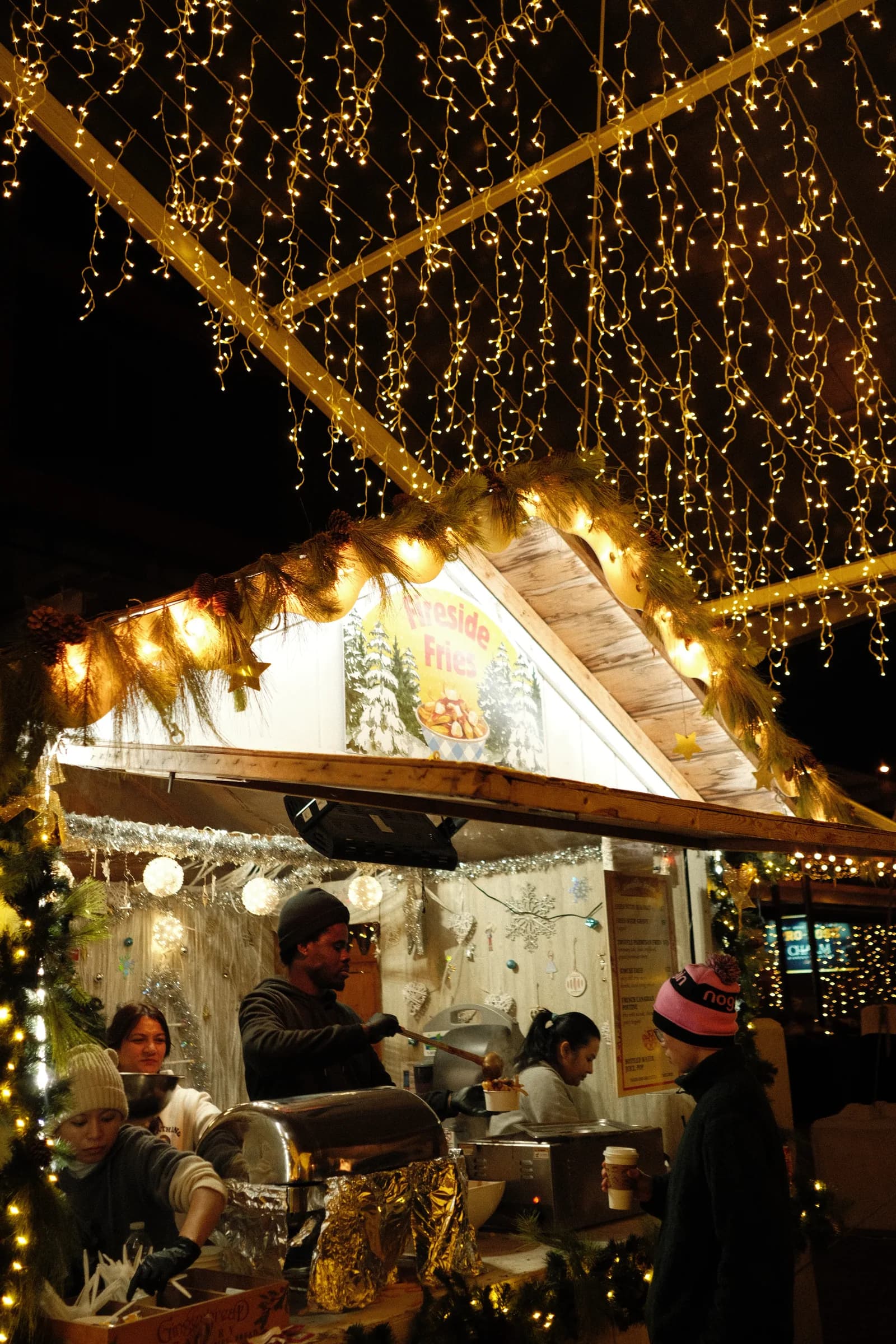 Lights strung above a night market